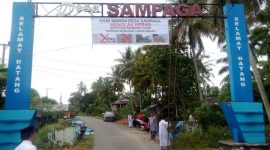 Spanduk Penolakan Tambang Pasir Di Pintu Gerbang Desa Sampaga